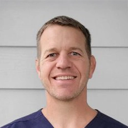 A headshot photo of Dr. Jason Palmer, the chiropractor at CHIRO + LASER Saint Augustine